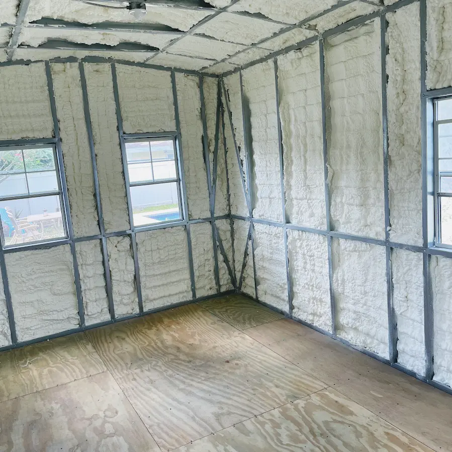 Closed-cell spray foam insulation applied to wall cavities in a residential project in Streetsboro